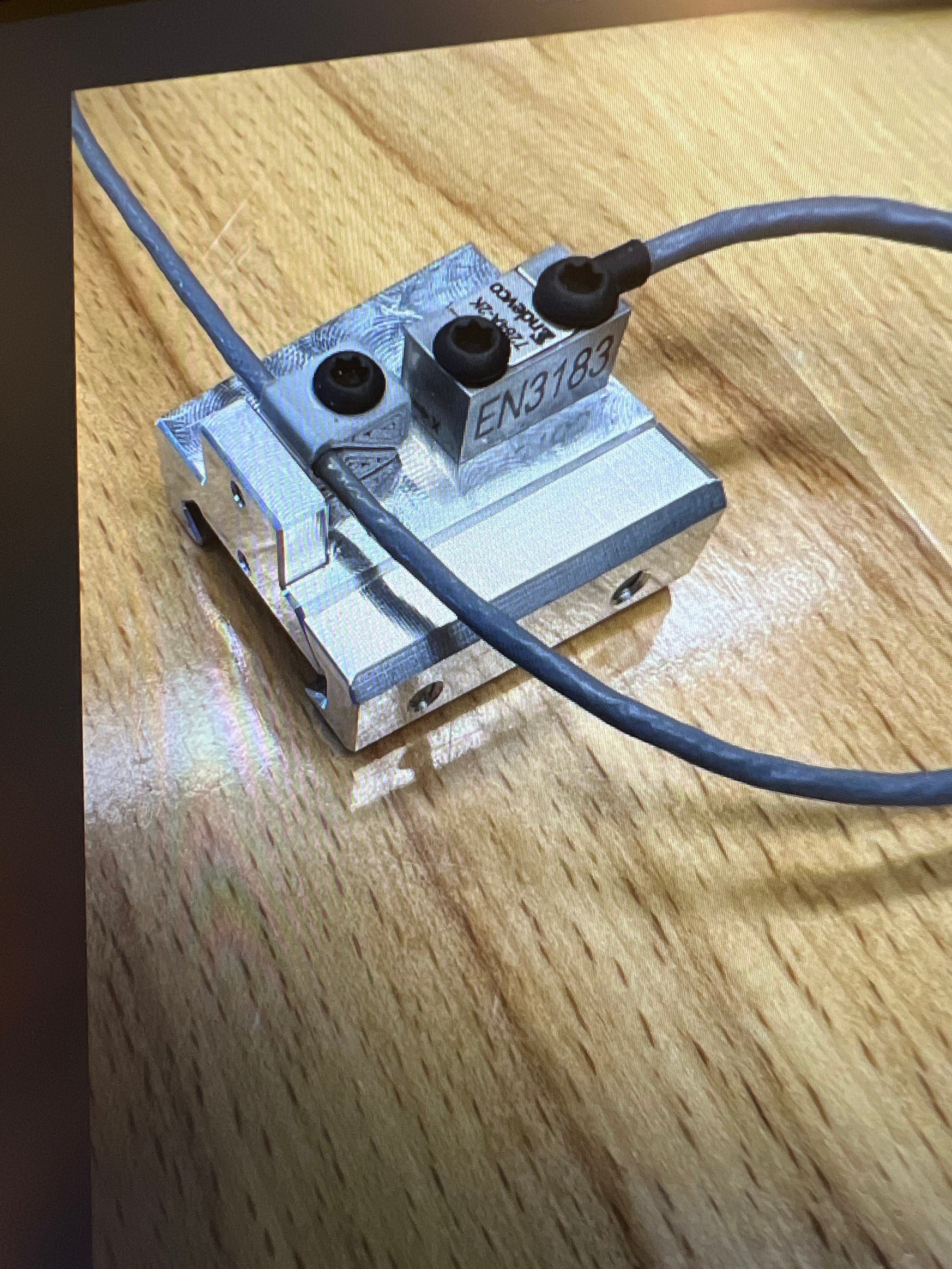 Accelerometer mount to picatinny rail.  Designed for Endevco 7270, 7280, 7274, 7284 series piezoresistive accelerometer sensors.